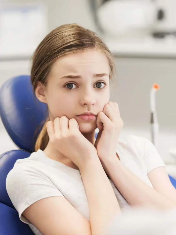 Patient receiving emergency tooth extraction treatment at Carbondale dental office