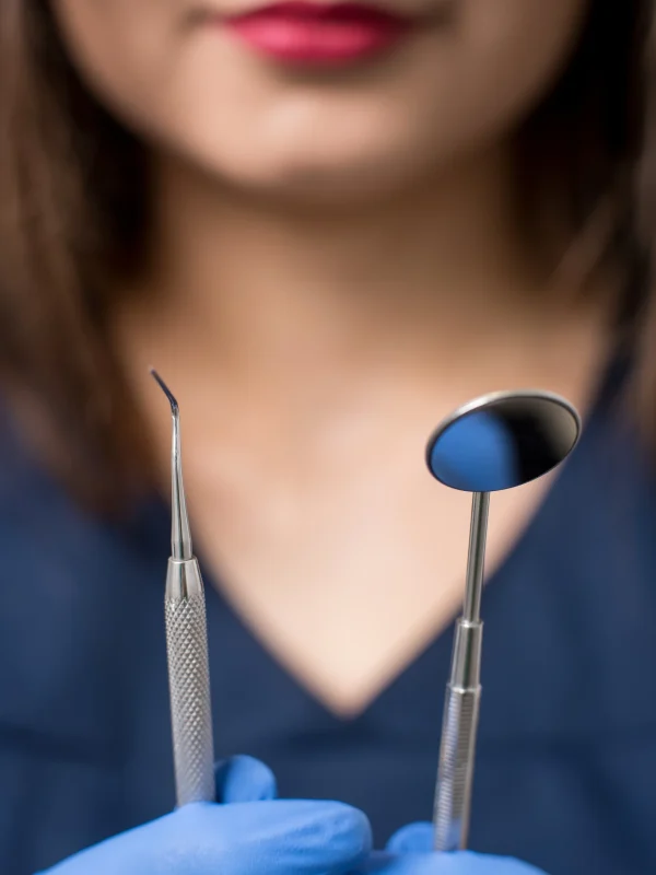 Patient receiving professional dental exam and cleaning at Rivers Dentistry