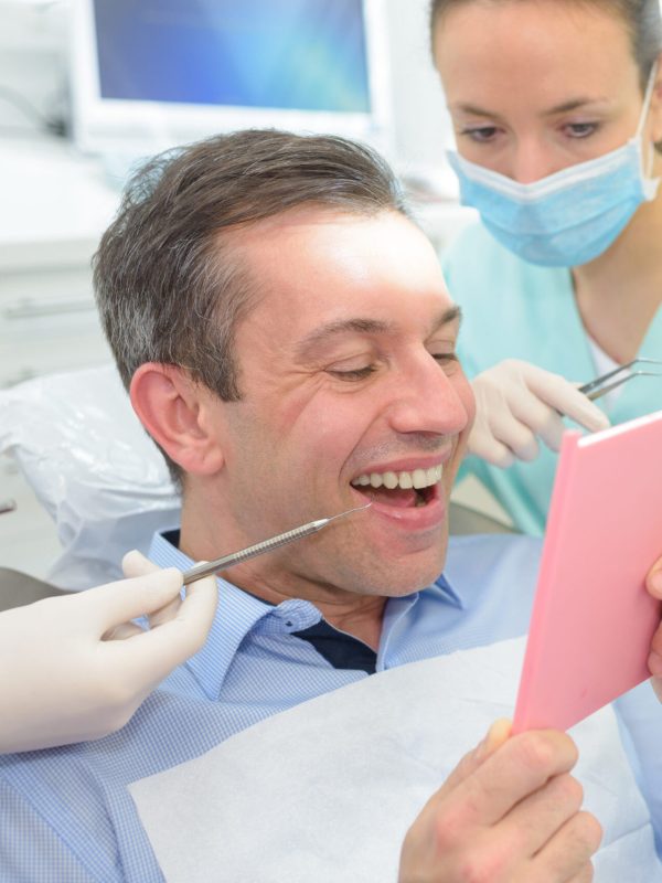 patient with mirror gap after tooth extraction