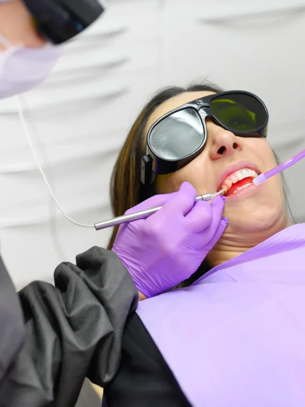 Dentist Using A Modern Diode Dental Laser. High quality photo
